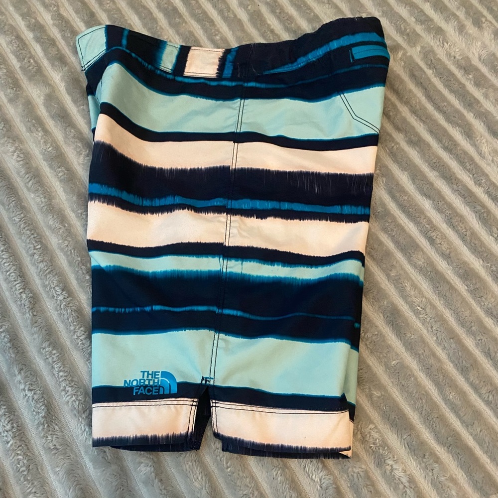 Boys Large The North Face swimming trunks. Gently used and in great condition.